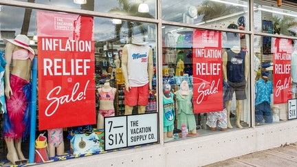 Miami Beach Florida, Collins Avenue, The Vacation Supply Company, window display sign inflation relief sale. 